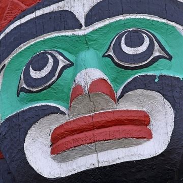 Ritual painted face as fragment of totem pole