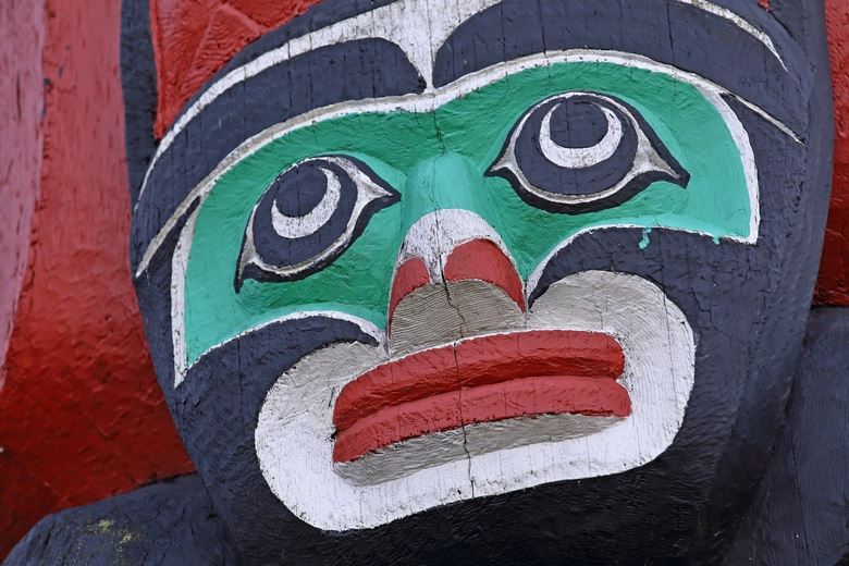 Ritual painted face as fragment of totem pole